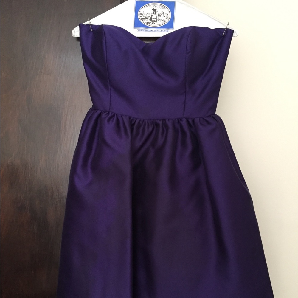 Coren Moore short purple bridesmaid dress